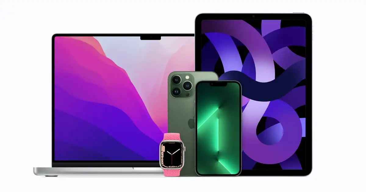 Laptop, smartphone, and smartwatch on a white background