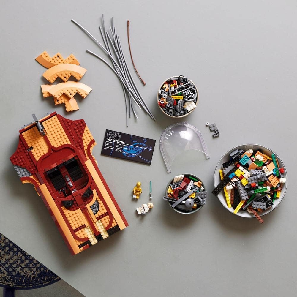 Unassembled LEGO Star Wars 75341 parts and instruction booklet flat lay